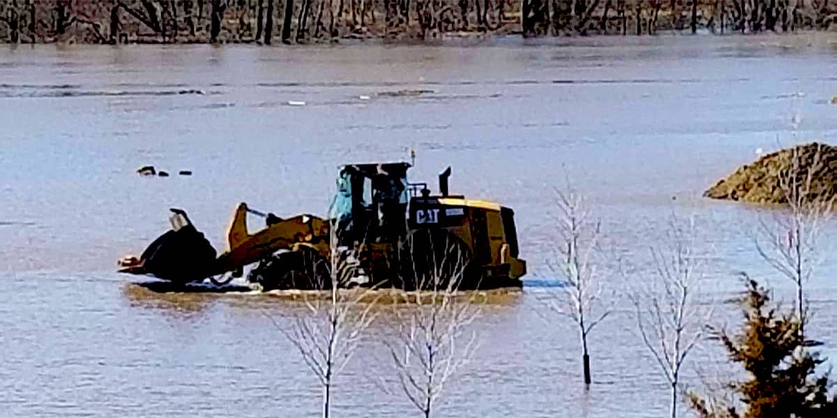 Equipment submerged in water after flood