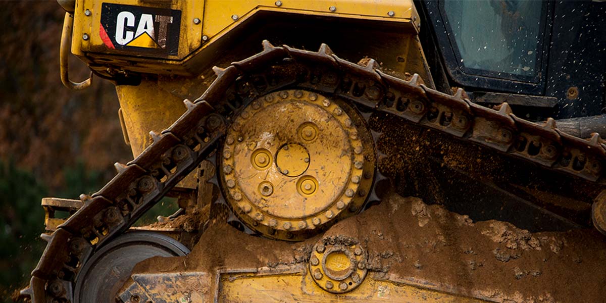 Close up of the undercarriage of Cat vehicle