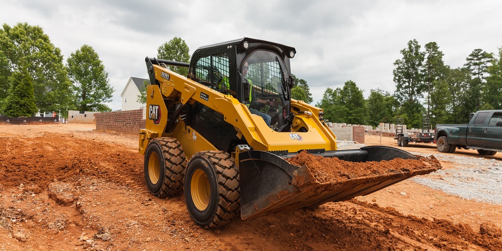 Wheel loader working on a dirt pile